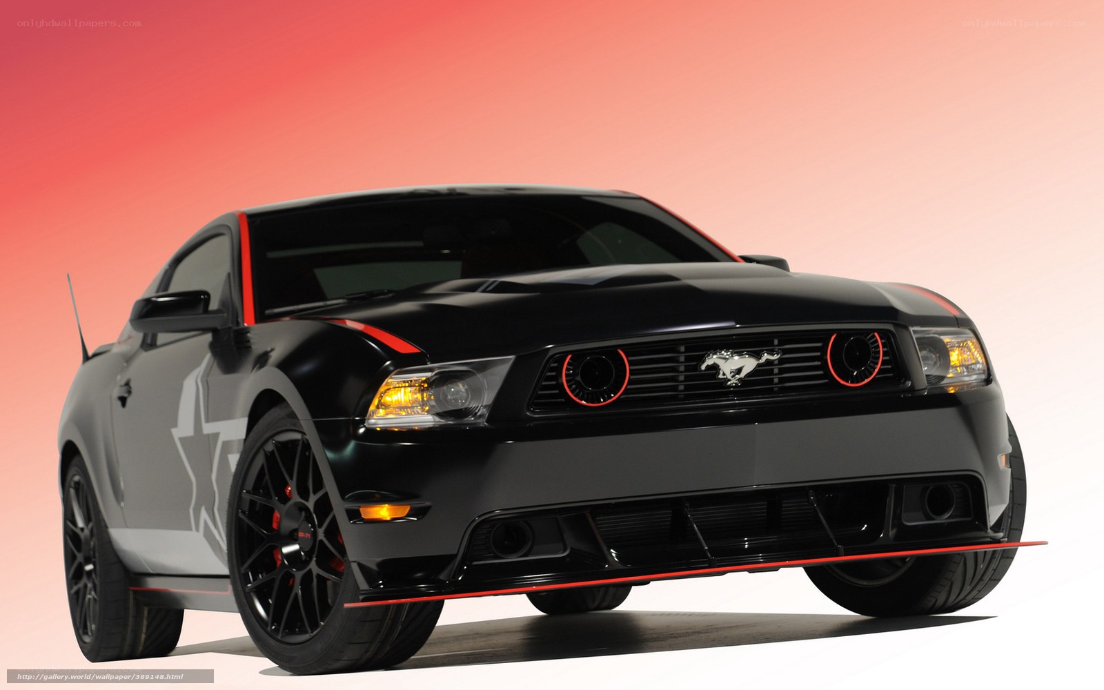 Black Ford Mustang with red accents