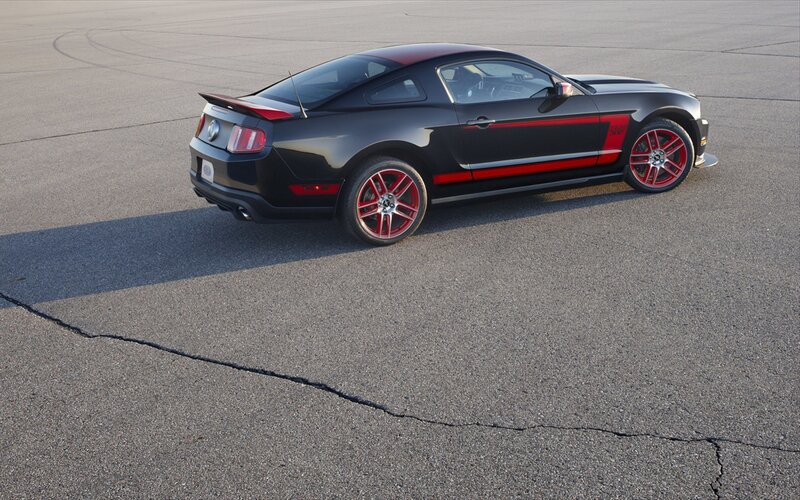 Black Ford Mustang with red accents