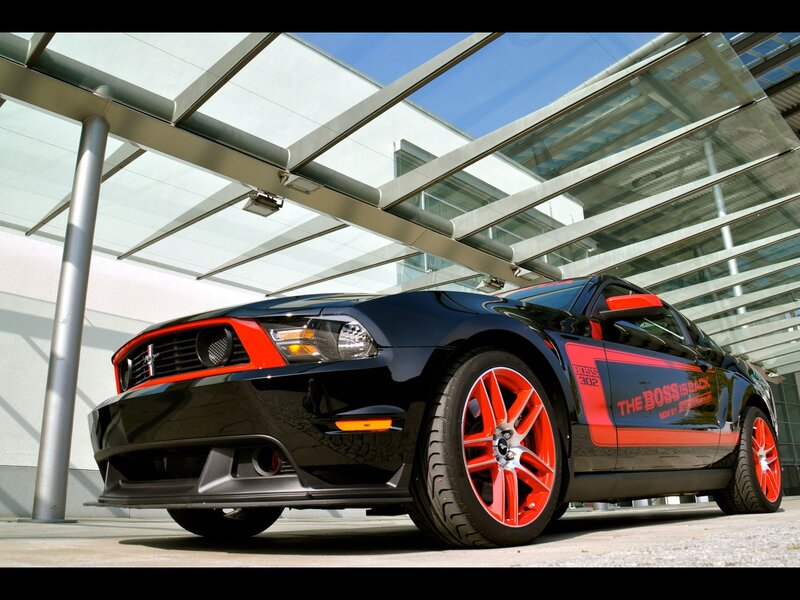 Black Ford Mustang with red accents
