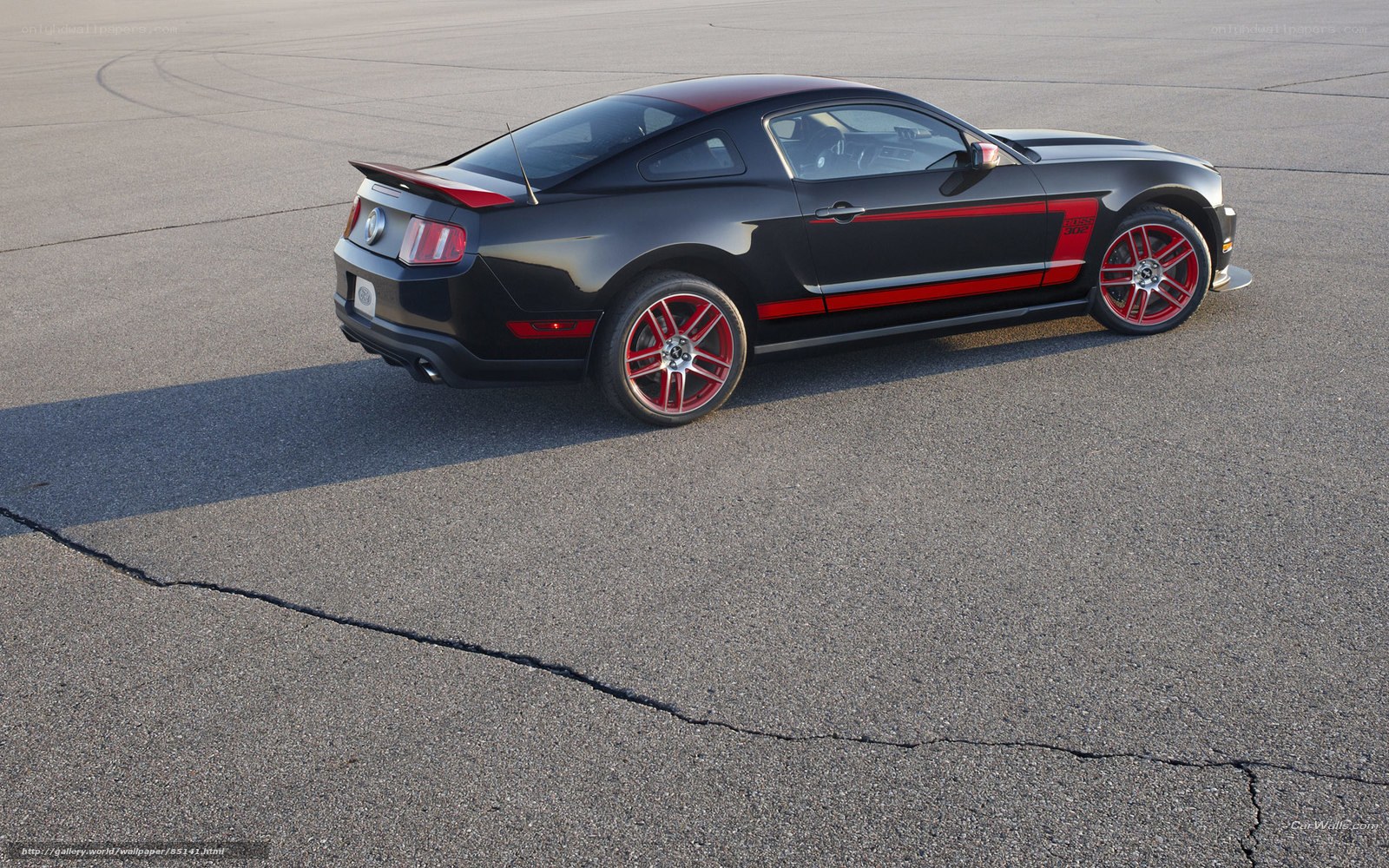 Black Ford Mustang with red accents