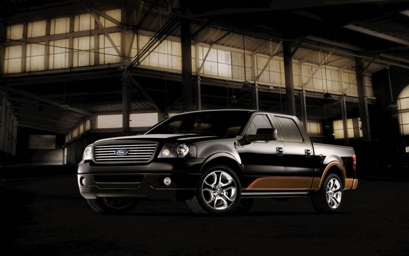 black ford pickup truck in warehouse