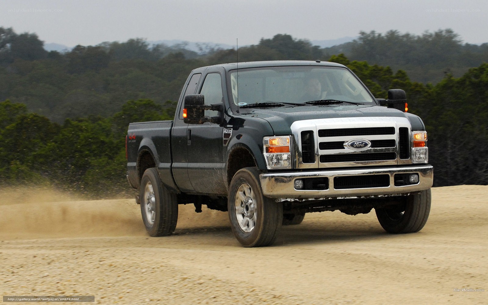 black ford pickup truck on dirt road