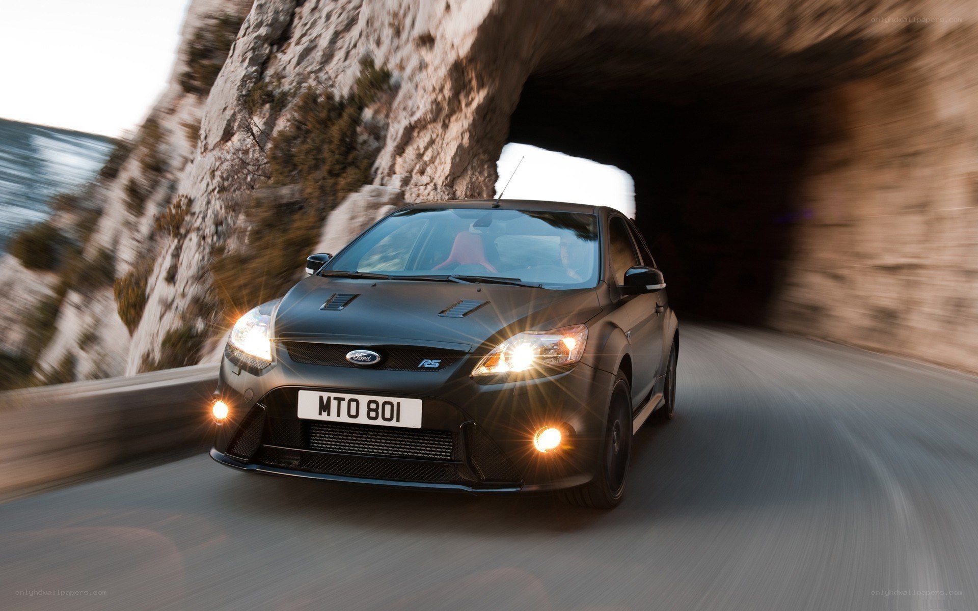 black ford rs car driving