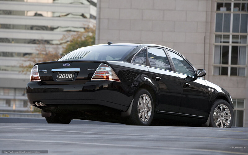 Black Ford Taurus Sedan — Neutral