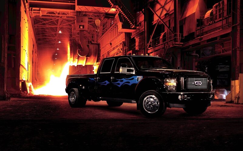 Black Ford truck in steel mill