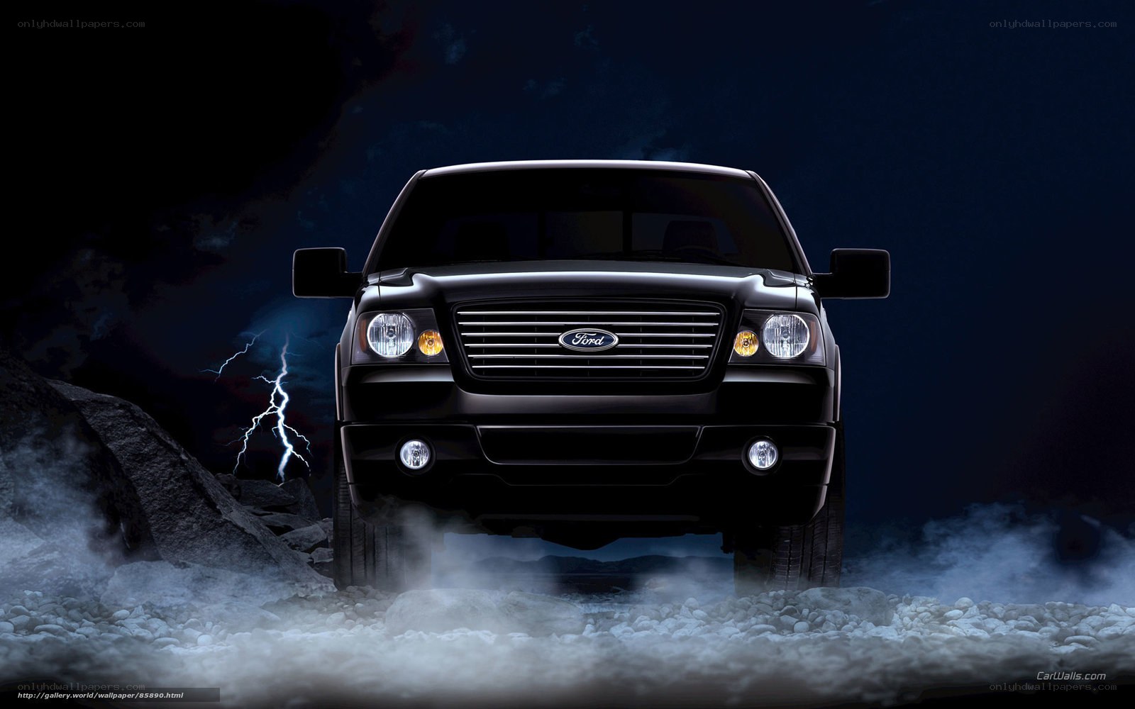 Black Ford truck in storm
