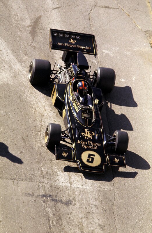 Black Formula One Car — Dynamic, Afternoon, Photograph, Driver