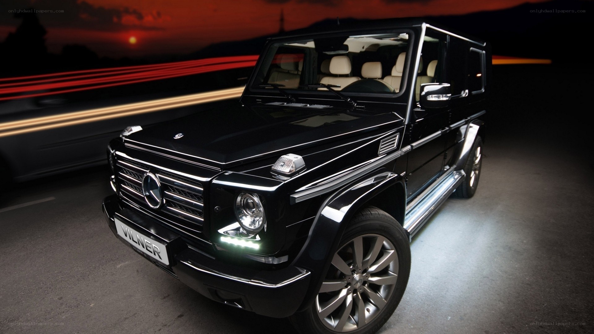 Black G-Wagon at sunset