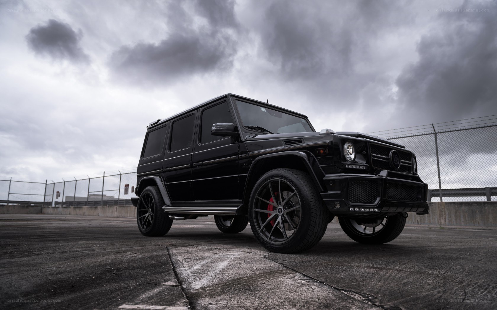Black G-Wagon on rooftop