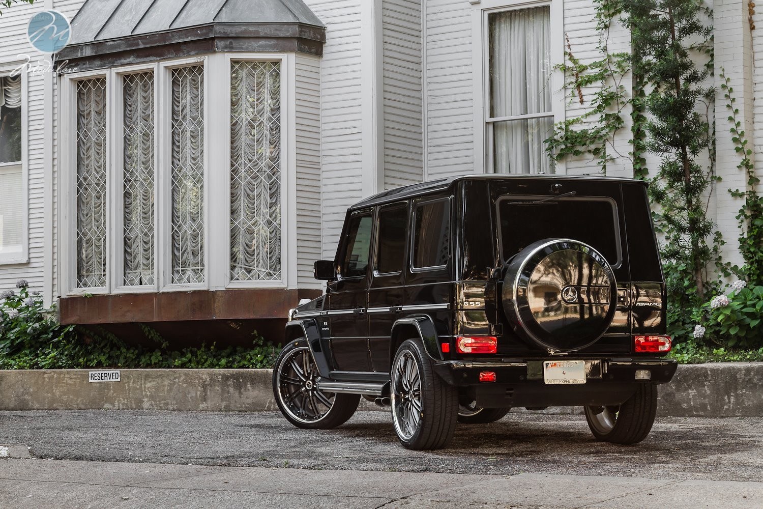 Black G-Wagon parked outside