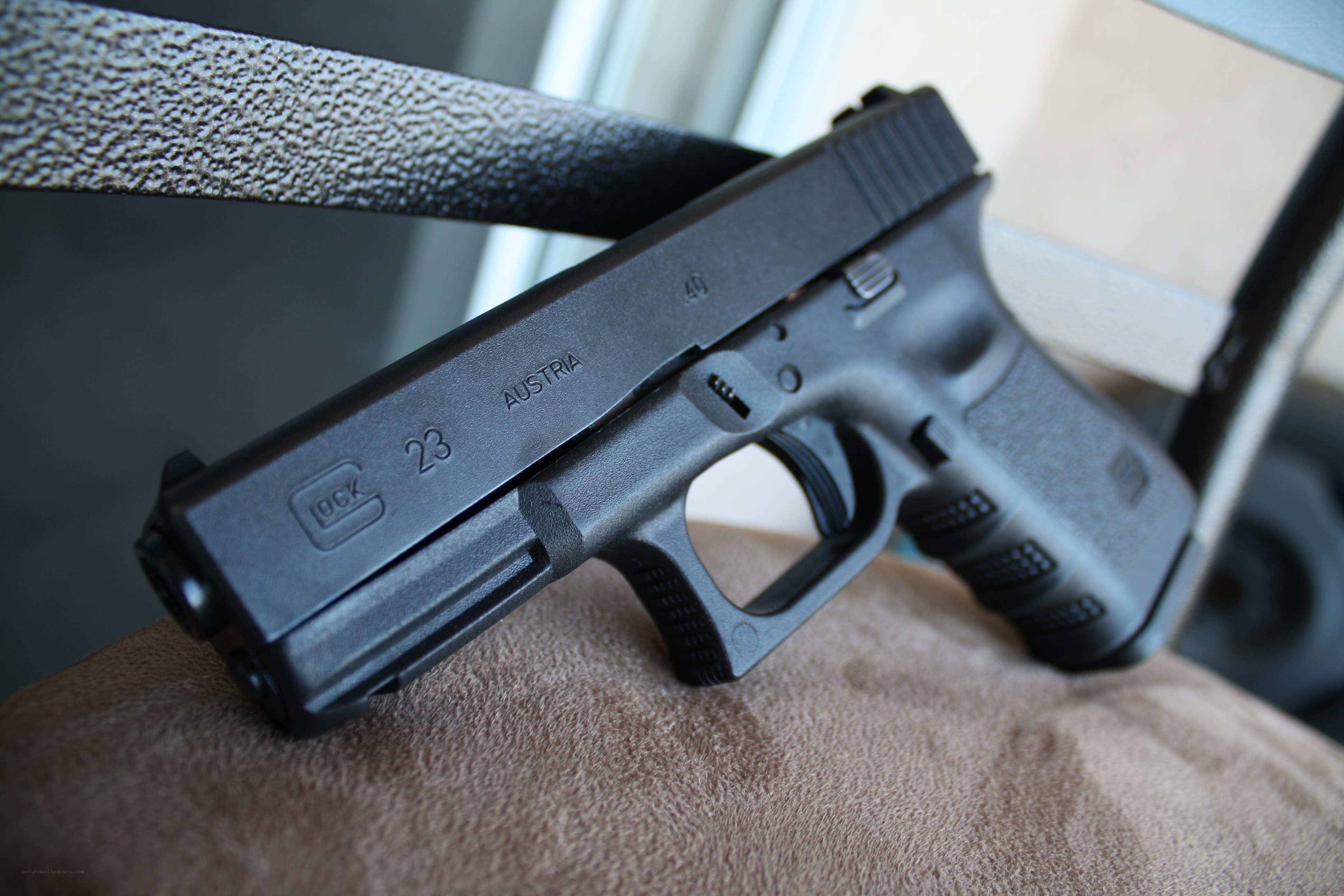 Black Glock 23 pistol