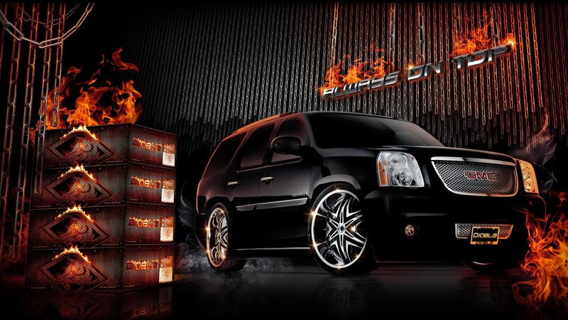 Black GMC SUV with flames