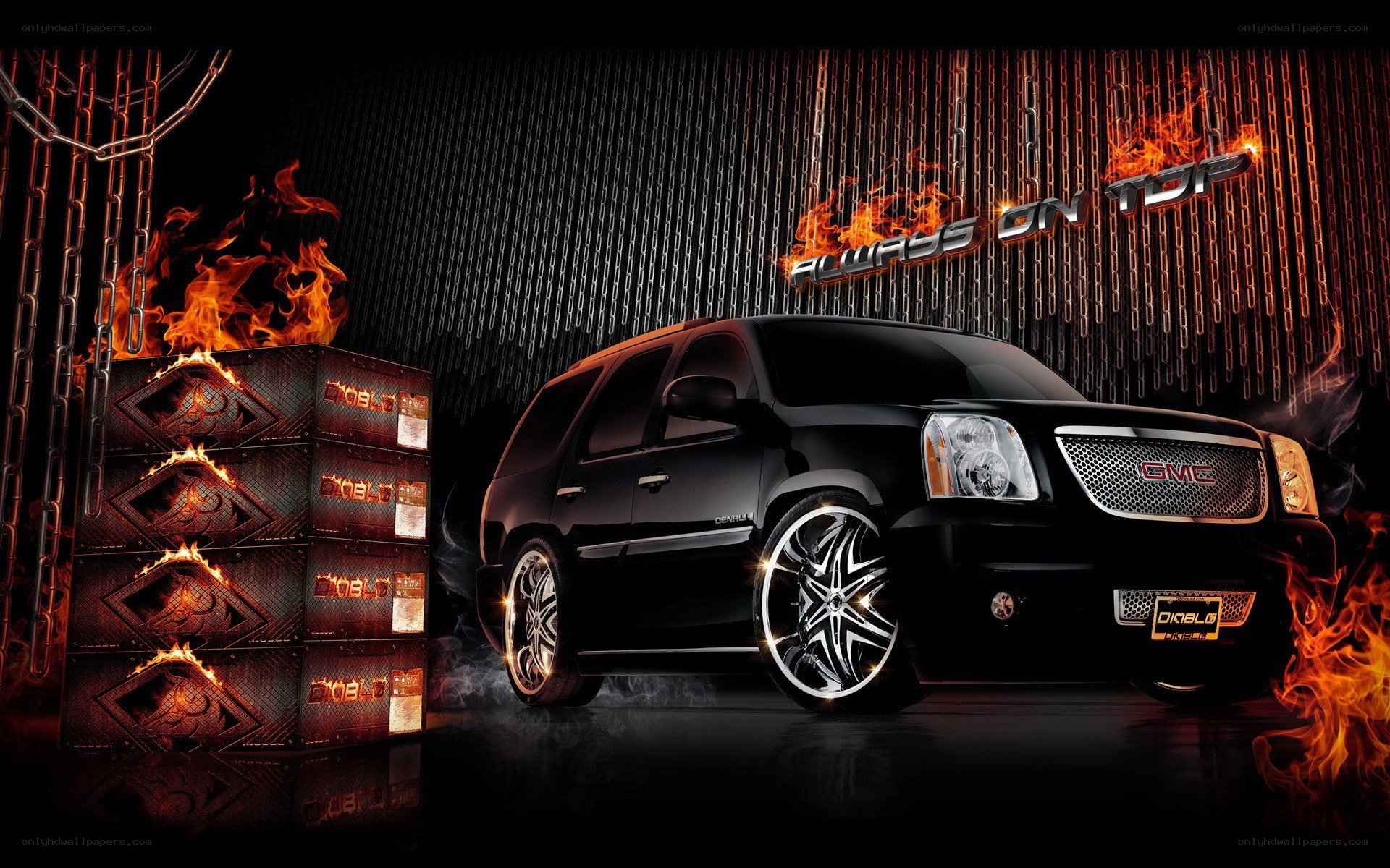 Black GMC SUV with flames