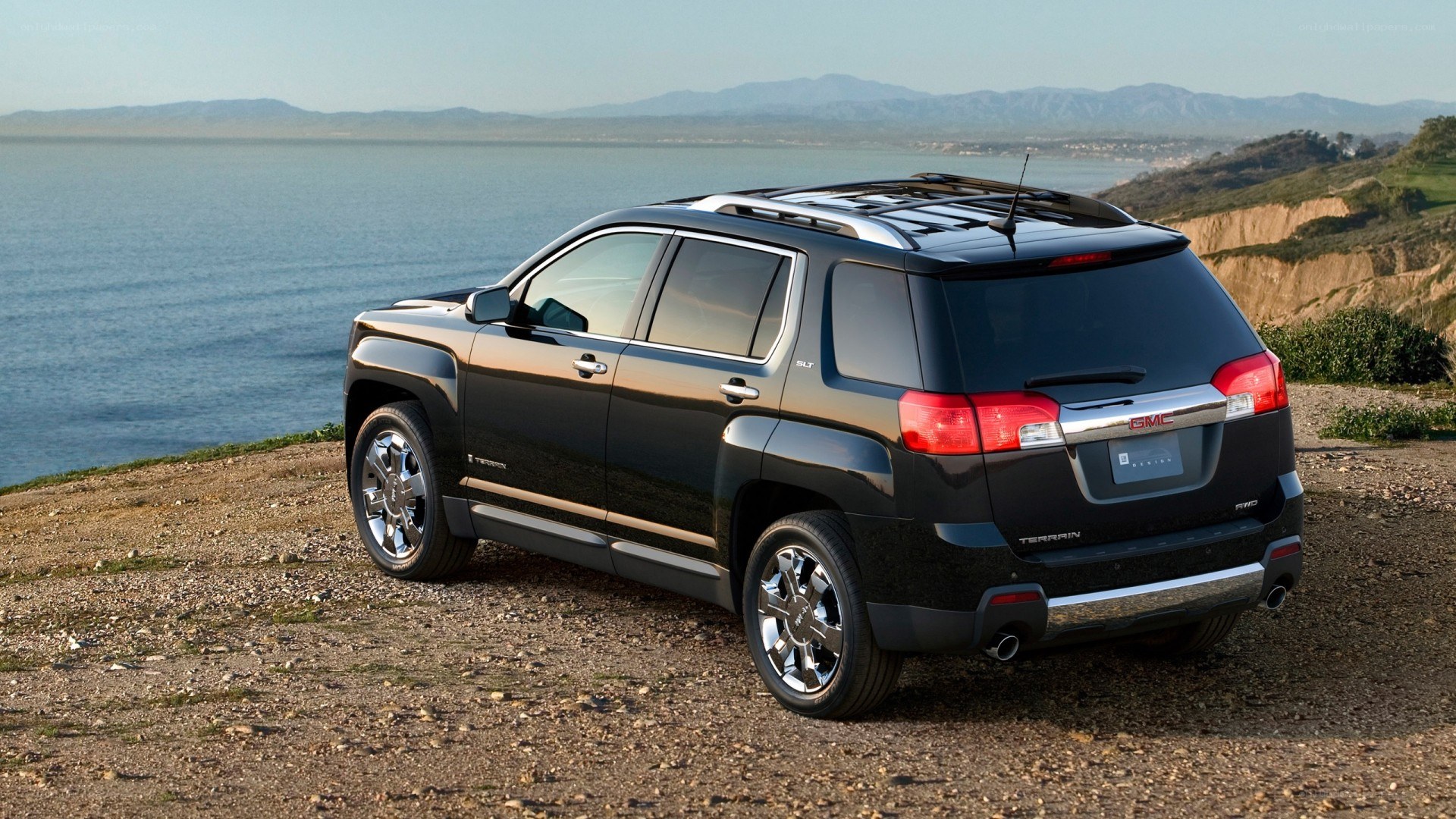 Black GMC Terrain by the coast