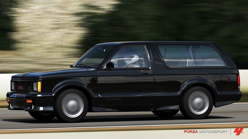 Black Gmc Typhoon Suv