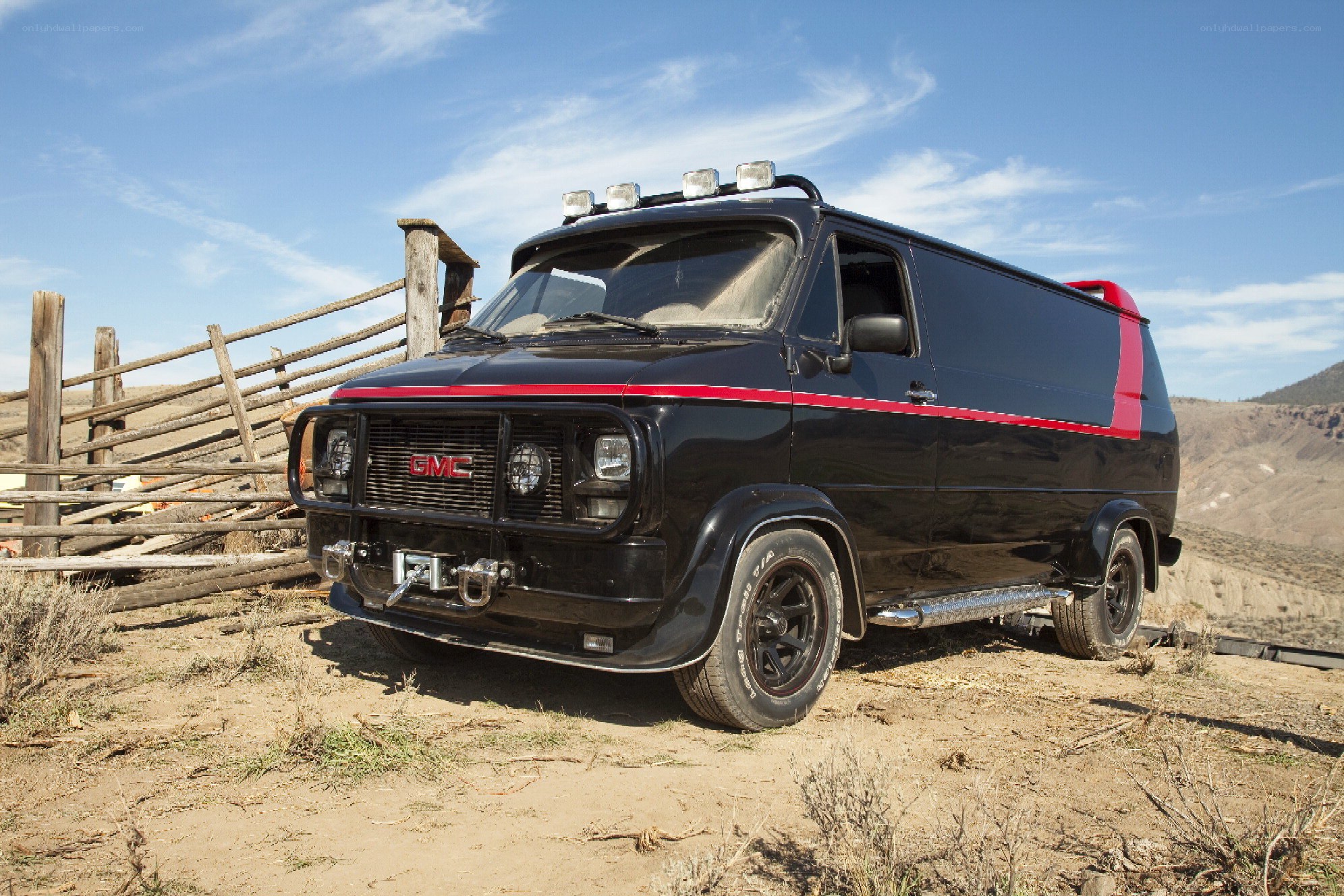 black gmc van in desert