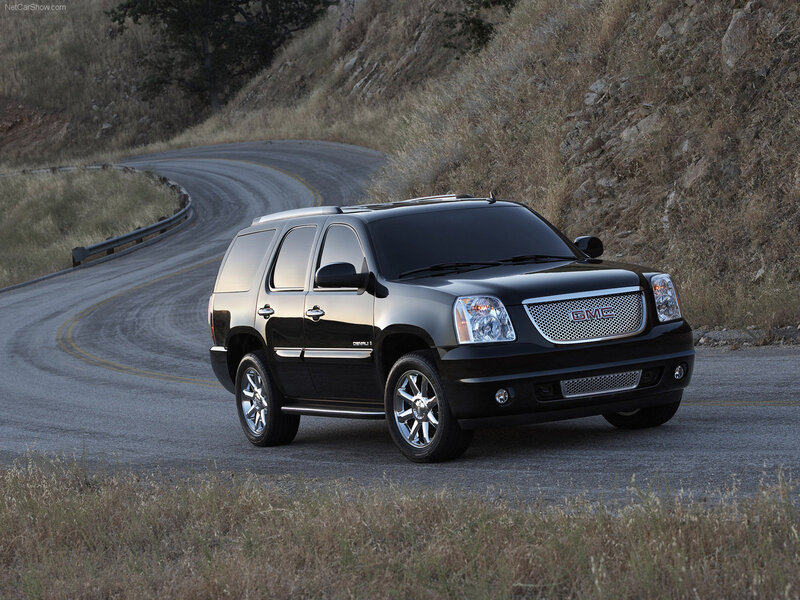 Black Gmc Yukon Suv — Dramatic