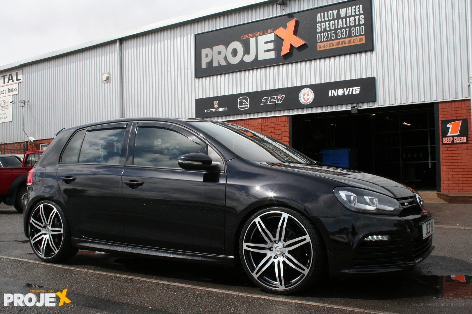 Black Golf with custom wheels
