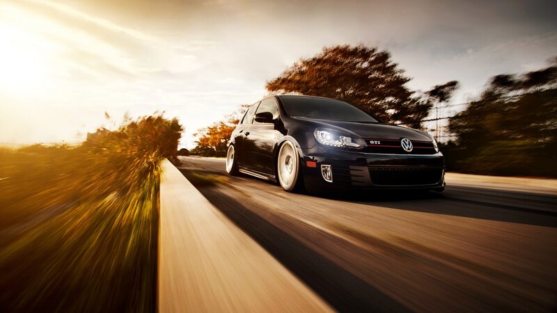 Black GTI on a country road