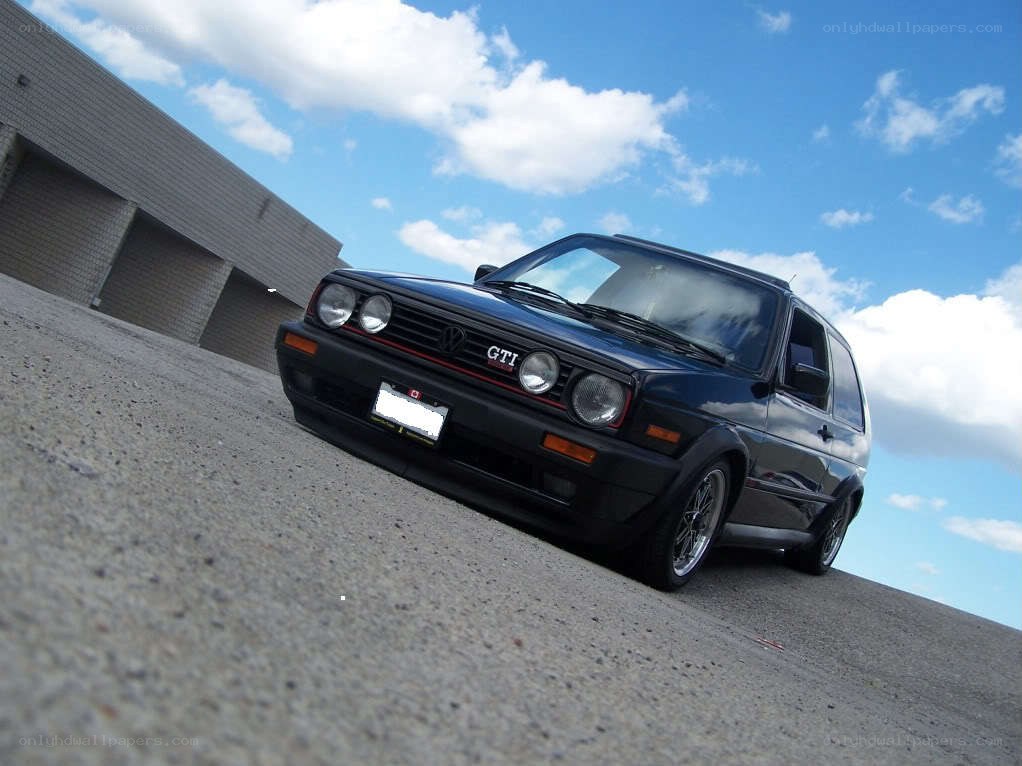 Black GTI on asphalt