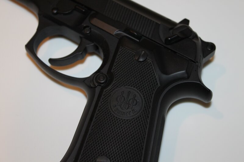 Black Handgun — Neutral, Photograph