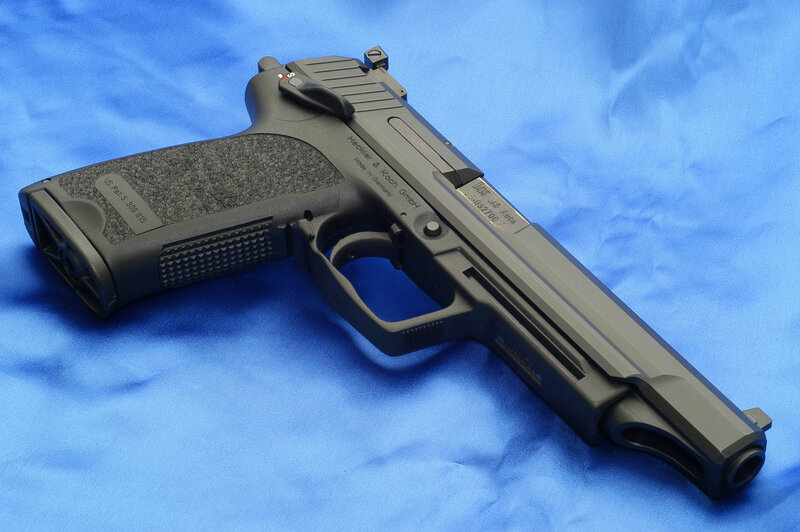 black handgun on blue cloth