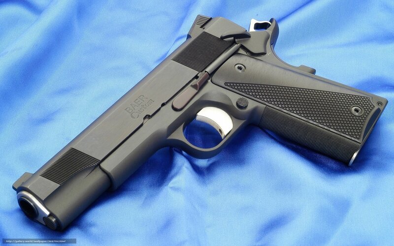 Black Handgun on Blue Cloth — Neutral, Photograph, Blue Cloth, Gun, Text