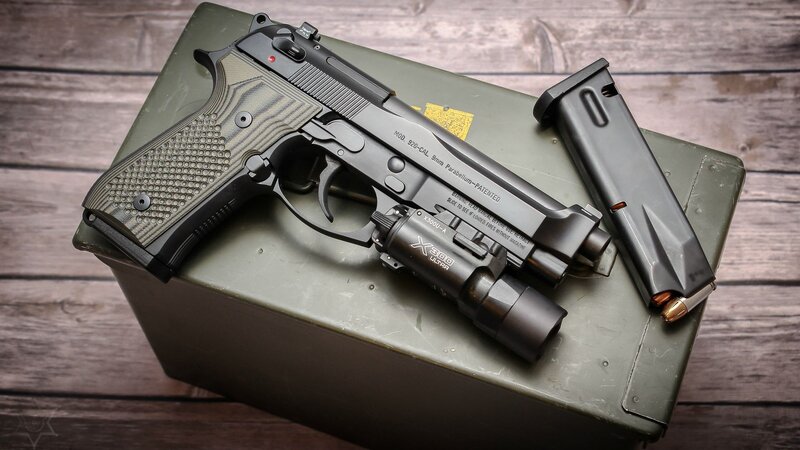 Black Handgun on Box