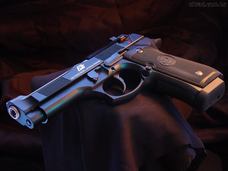 Black Handgun on Cloth