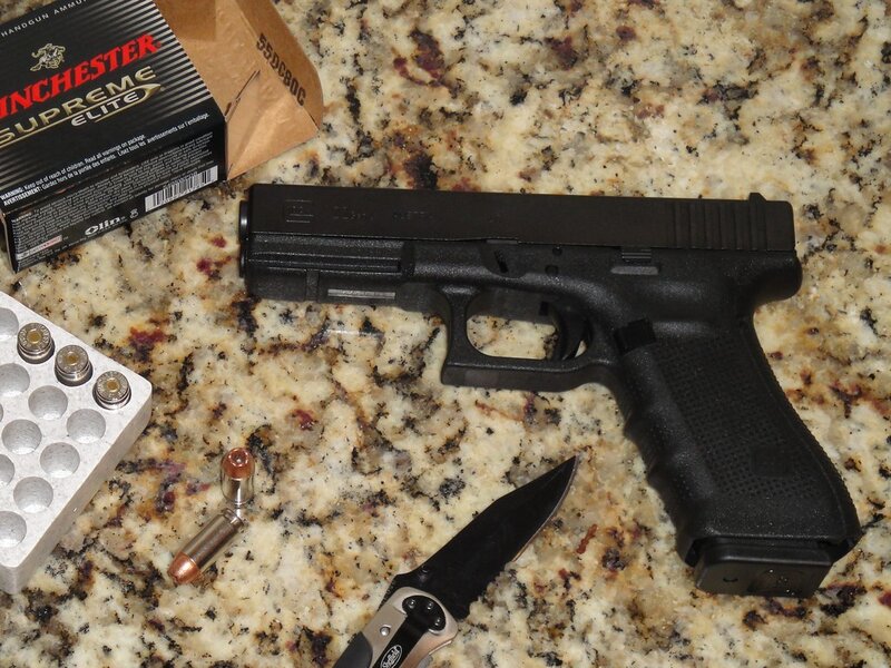 Black Handgun on Countertop