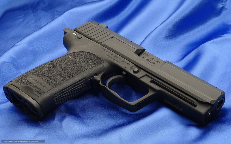 Black Handgun on Fabric — Blue