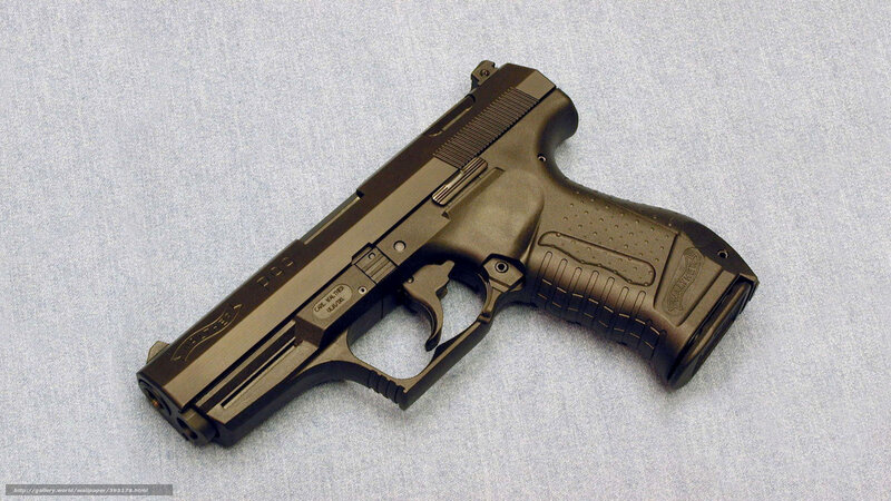 Black Handgun on Fabric — Brown