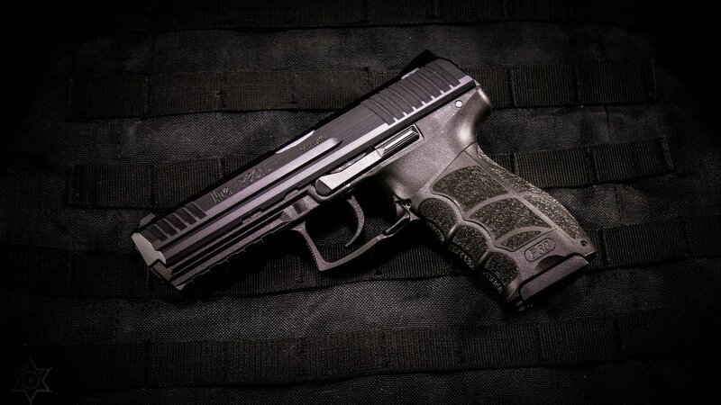 Black Handgun on Fabric — Dramatic, Photograph