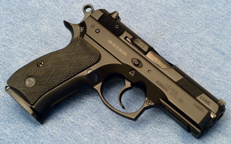 Black Handgun on Fabric — Neutral, Blue