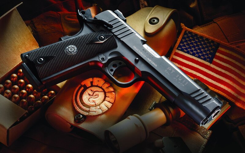 Black Handgun on Gear