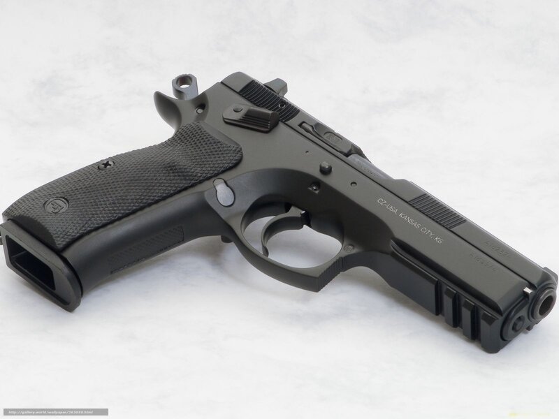black handgun on marble