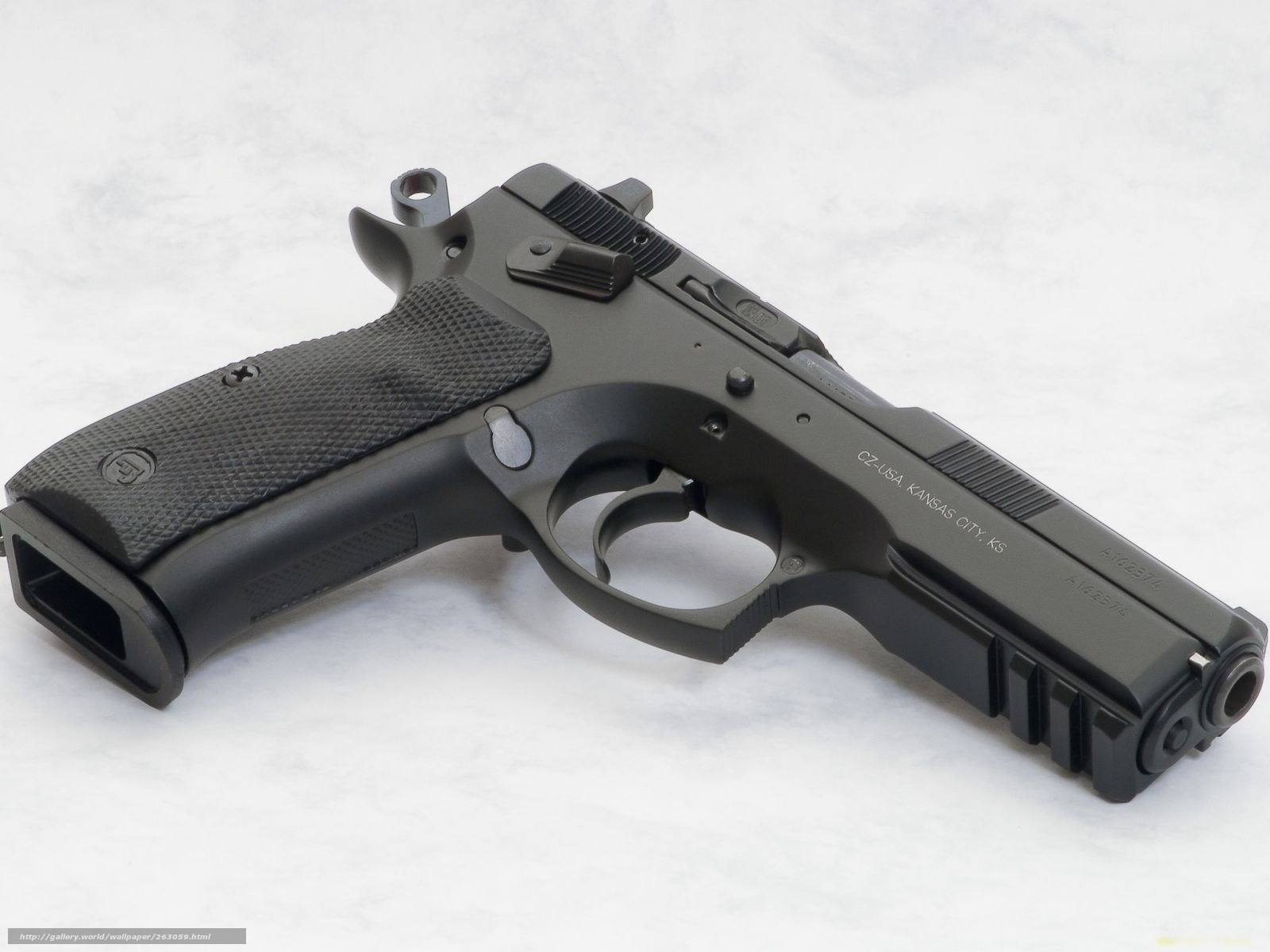 black handgun on marble