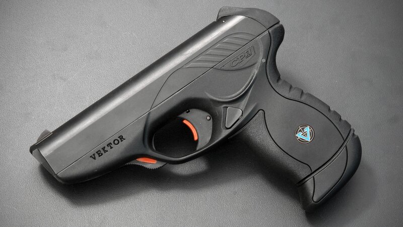 Black Handgun on Surface — Neutral