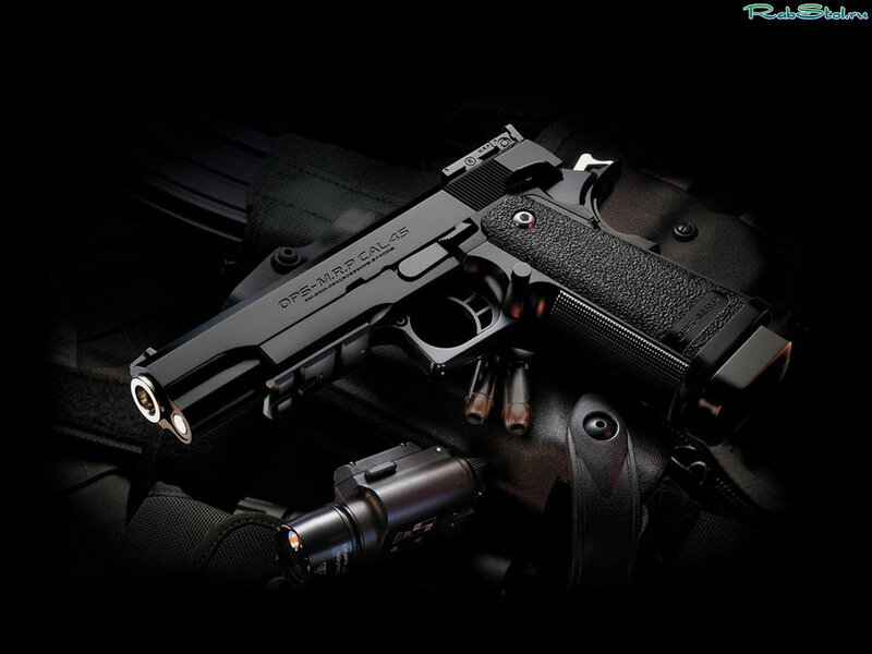 Black Handgun with Accessories — Dramatic
