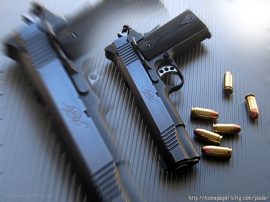 Black handgun with bullets