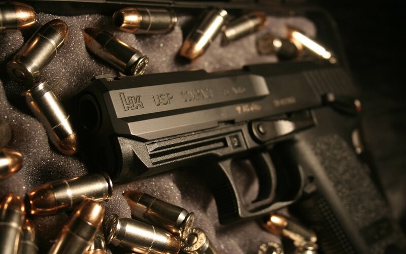 Black Handgun with Bullets — Dramatic, Photograph, Foam Case