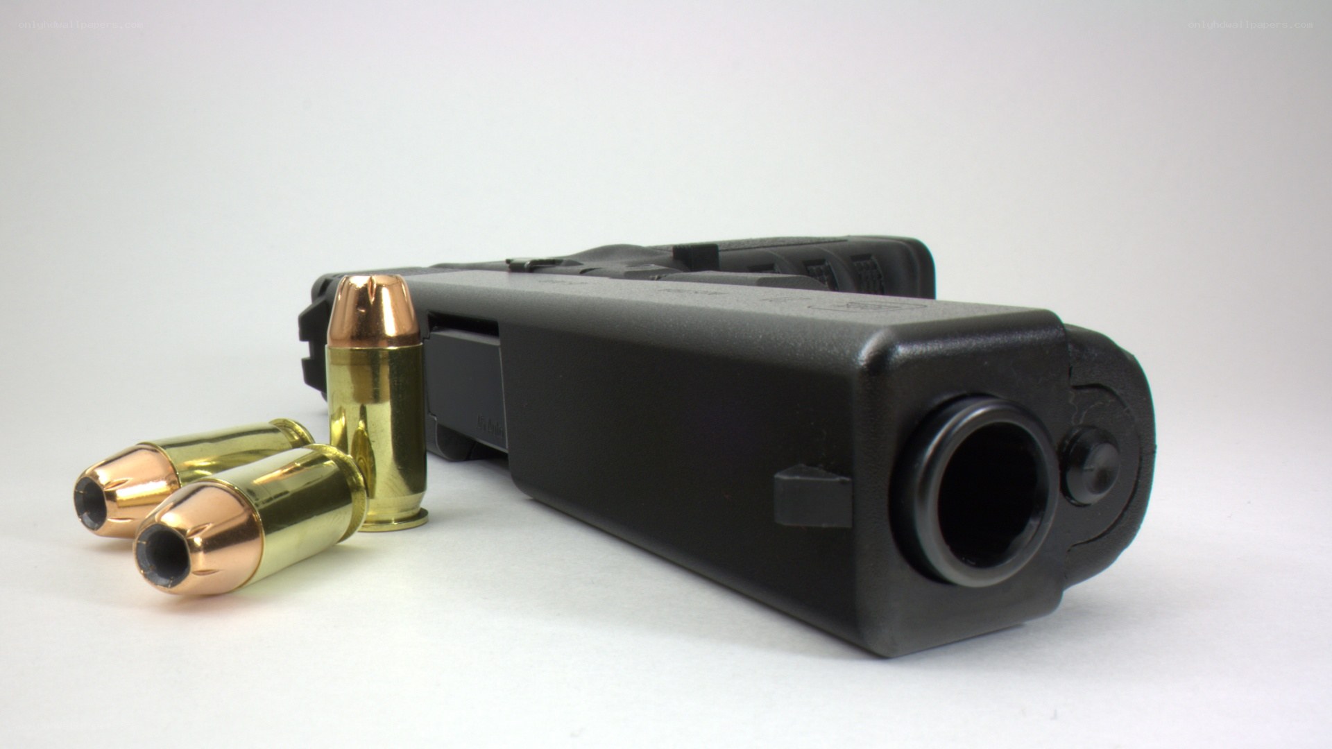 black handgun with bullets