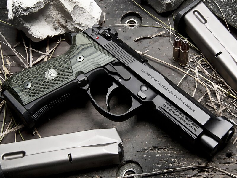 Black Handgun with Green Grips