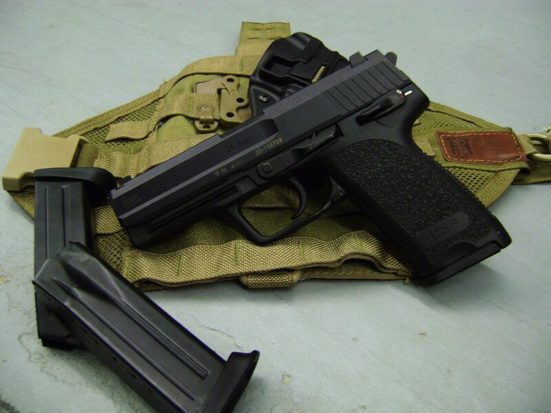 black handgun with magazine