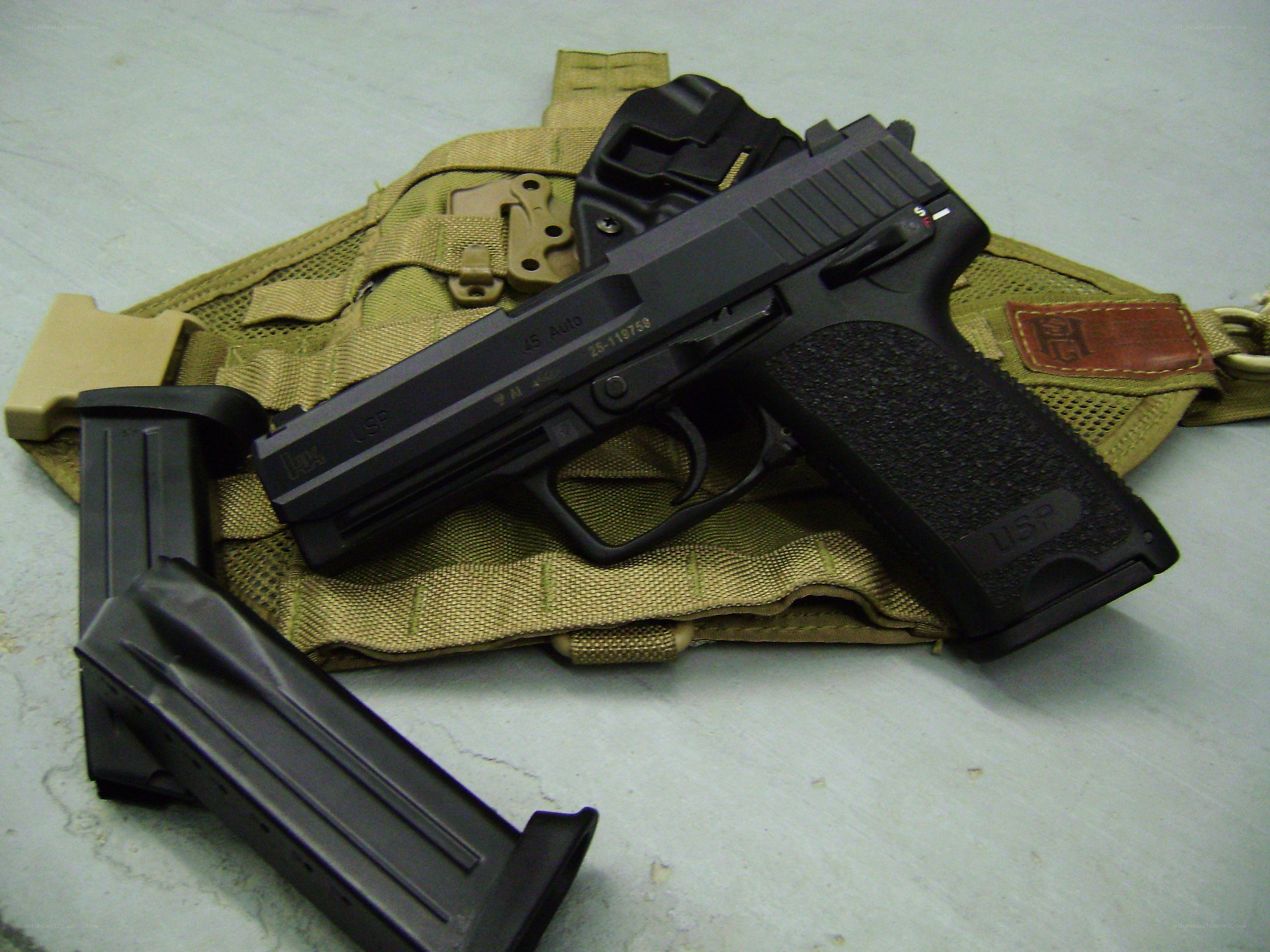 black handgun with magazine