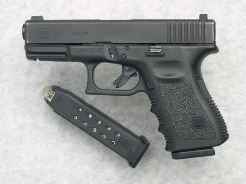 Black Handgun with Magazine — Neutral, Photograph