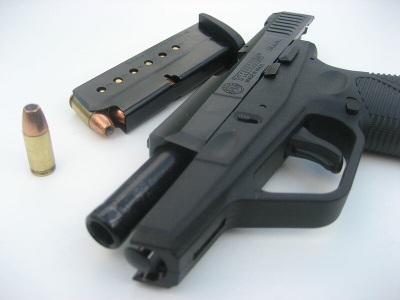 Black Handgun with Magazine — Neutral