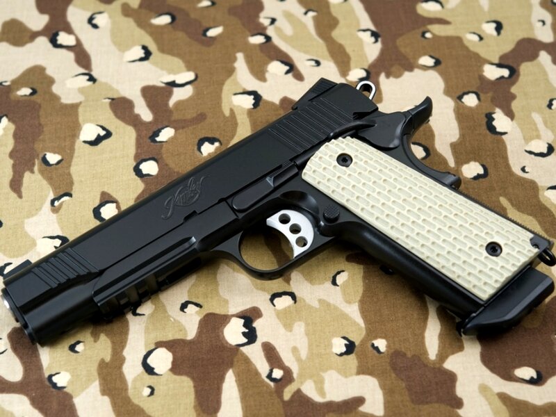 Black Handgun with Tan Grip