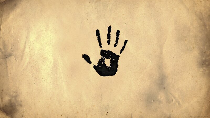 Black Handprint on Paper — Brown