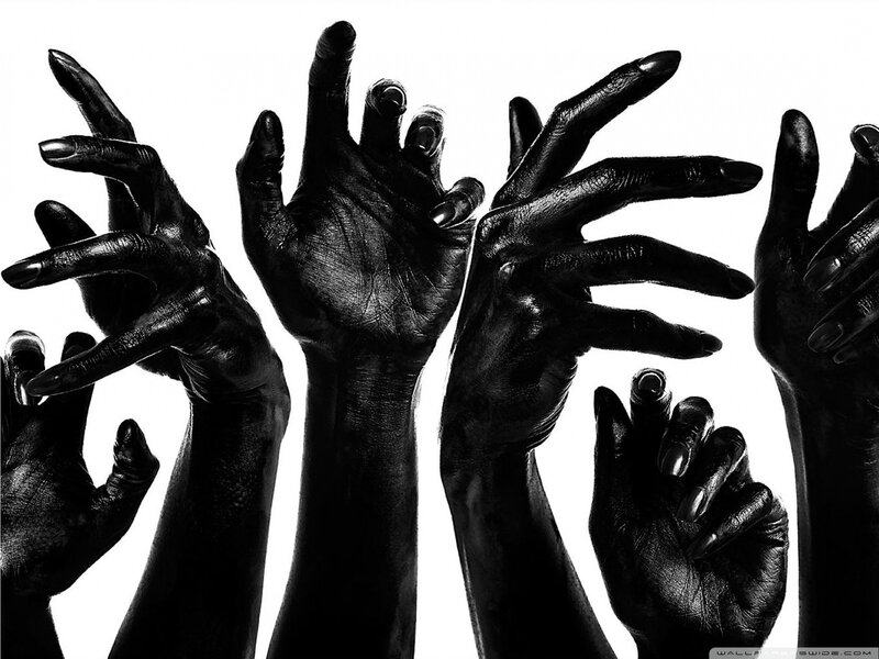 black hands reaching up
